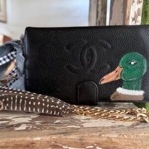 CHANEL Black Wallet with Duck Motif and Gold Chain